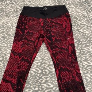 Red snake print Nike leggings.